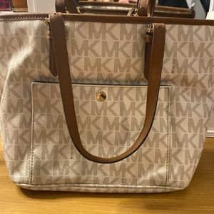 Michael Kors bag bought brand new. Used a few times. In like new condition.
